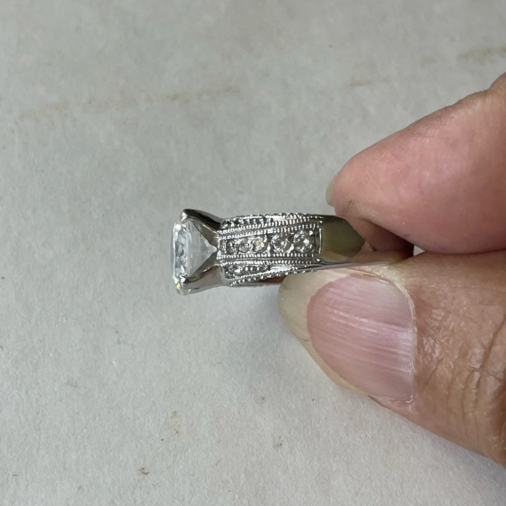 Silver and White Ring with Clear Gemstone and Milgrain Detailing - Picture 3 of 3
